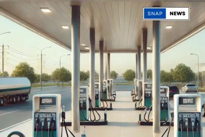 Modern petrol bunk with fuel pumps and vehicles refueling.