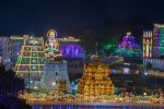 A serene view of the Tirumala temple surrounded by colourfull lighting