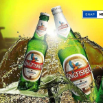 Kingfisher beer bottles on a shelf, highlighting the return of supply in Telangana after a pricing dispute resolution.