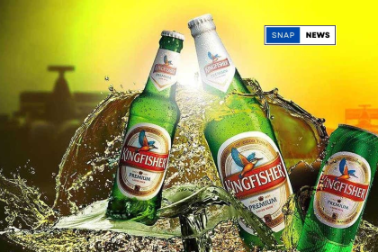 Kingfisher beer bottles on a shelf, highlighting the return of supply in Telangana after a pricing dispute resolution.