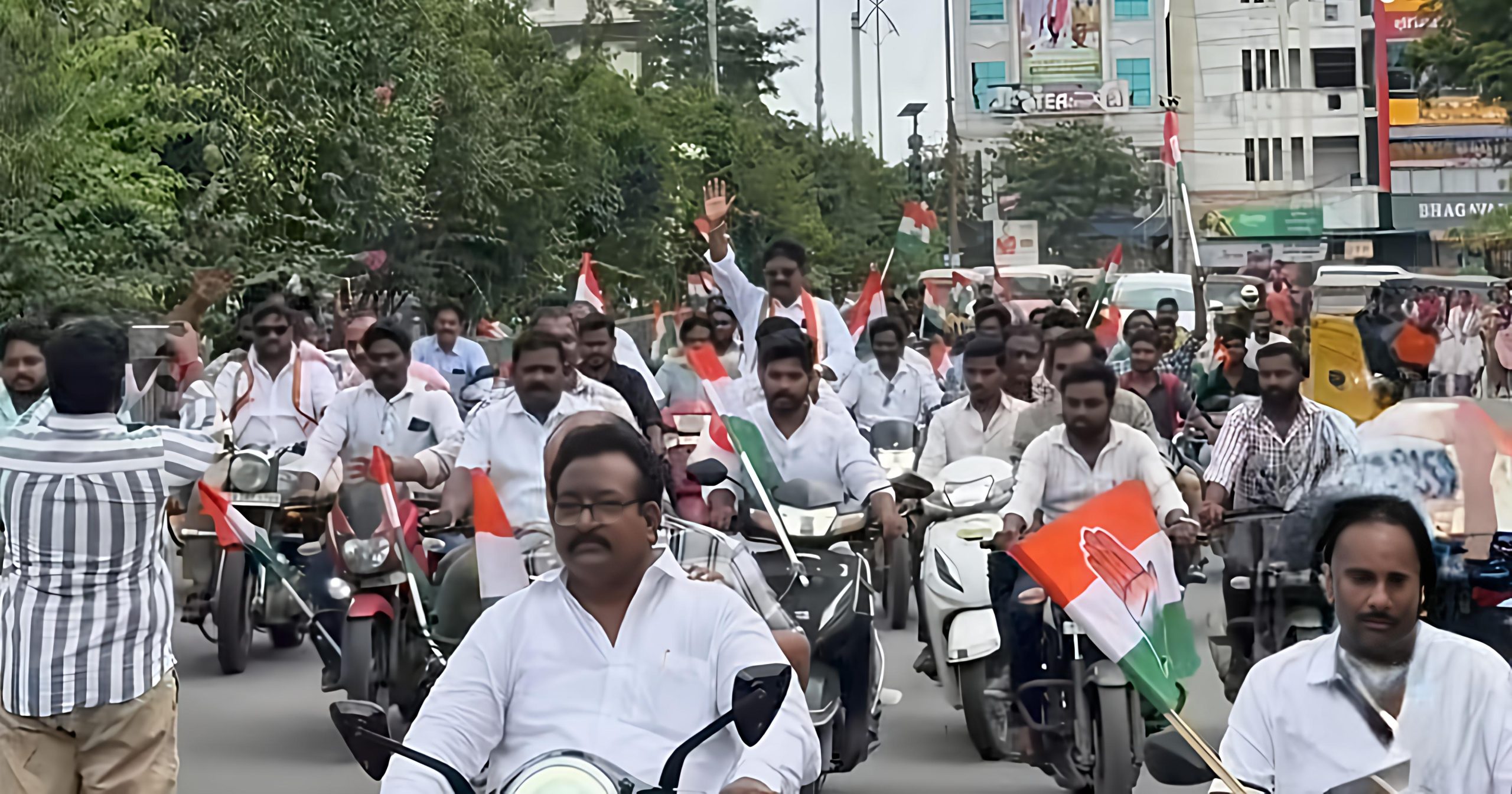 Congress Holds Bike Rally in Bhadrachalam, Demands Resignation of Opposition Leader 2 Bhadrachalam Congress bike rally